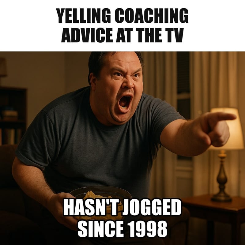 A heavyset middle-aged man standing up from his recliner, arm stretched toward the TV, mouth open mid-yell, holding a bowl of chips, living room at night. Caption: "Yelling coaching advice at the TV Hasn't jogged since 1998"